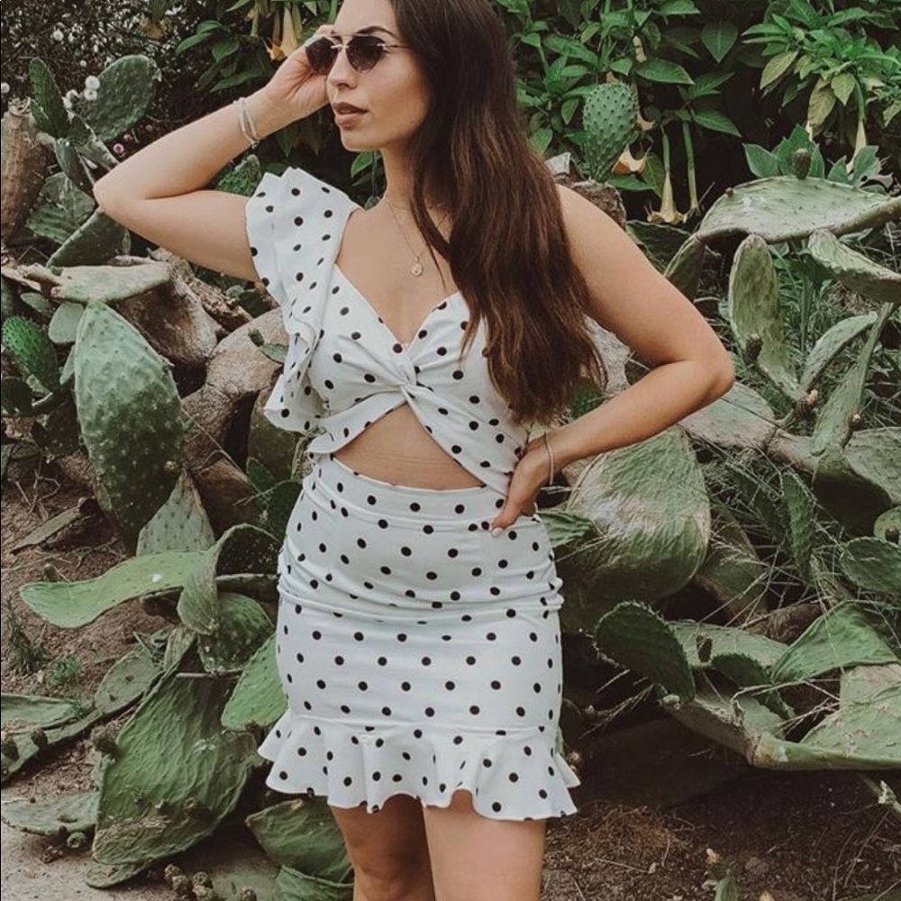 Polka dot mini dress with one ruffles sleeve